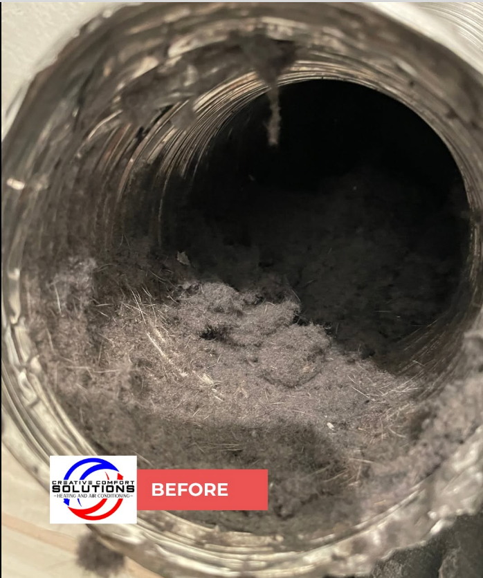 Dryer vent packed with lint before cleaning by Creative Comfort Solutions